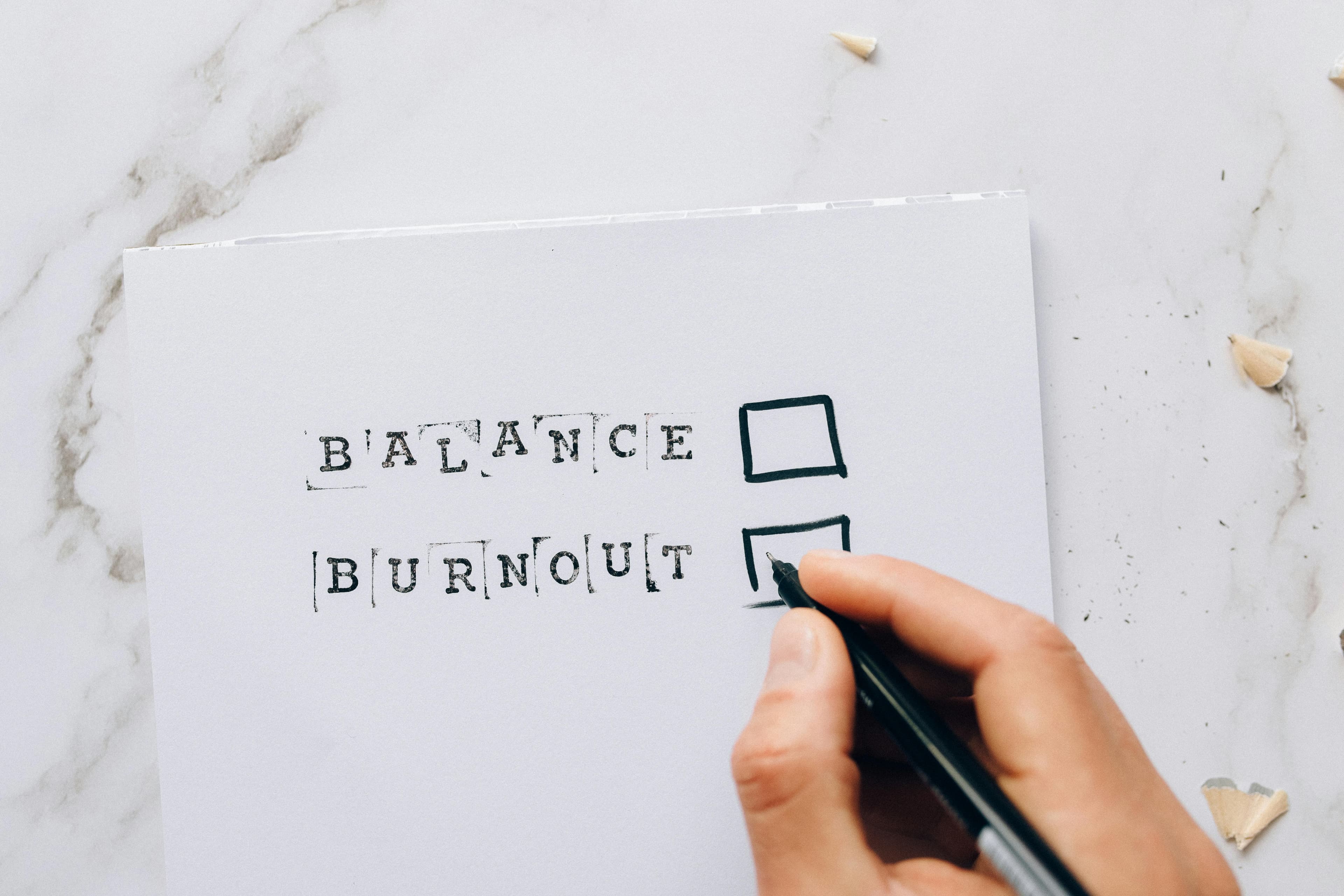 A checklist with two items: balance and burnout